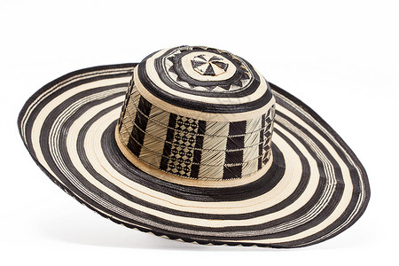 草帽图来自哥伦比亚的传统帽子符号草帽针织龙蒿褐色甘蔗字符串文化工艺品黑色背景