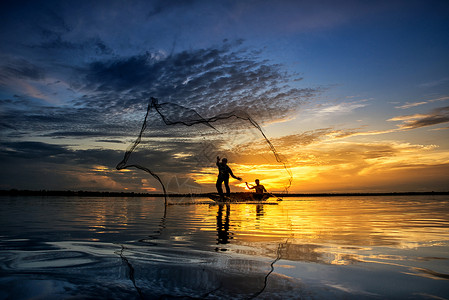 洛瓦特网泰国食物日落传统旅游旅行木头钓鱼渔夫反射波纹背景