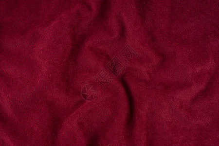 红色起皱纹的织物纹理背景图片