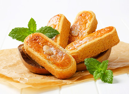荷兰杏仁饼干甜点蛋糕小吃食物杏仁羊皮纸饼干库存鸡蛋花背景图片