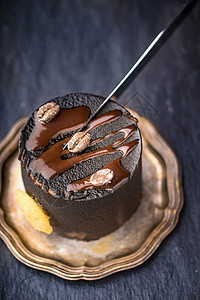 巧克力慕斯切刀片背景图片