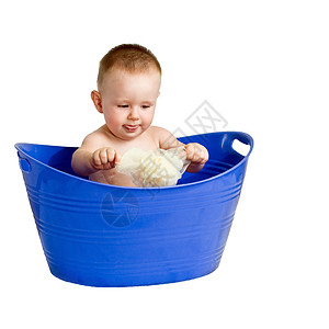 婴儿在A塑料浴缸玩耍背景图片