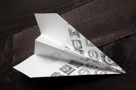 造纸飞机闲暇空气翅膀运输航班折纸航空白色玩具旅行背景图片