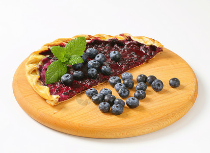 蓝莓油盆圆形食物蛋糕面团甜点美食水果砧板奶油高清图片