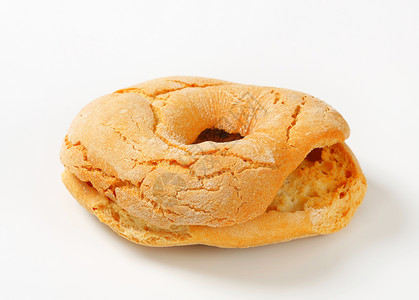 环形面包卷甜甜圈形美食烤箱库存面包小吃食物背景图片