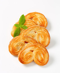 Palmiers  松饼饼干酥皮食物点心甜点糕点小吃美食饼干手掌背景图片