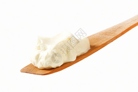 烟灰缸上的碳酸盐低脂肪酸奶奶油食物白色奶制品背景图片