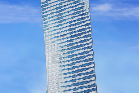 现代建筑的玻璃面孔公司高楼外观业务工作天空晴天金融房地产地点背景图片