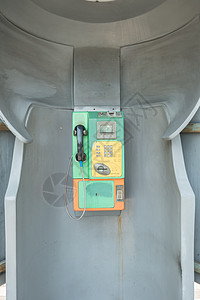 旧的泰国电话箱技术绿色电话亭服务电话民众城市盒子背景图片