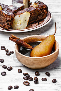 梨饼和咖啡肉桂餐厅棕色乡村盘子饼干烘烤水果面包馅饼背景图片