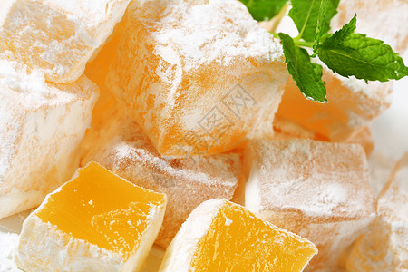 果冻果冻立方体希腊土耳其喜悦正方形明胶涂层美味美食软糖糖果糖粉乳香甜点背景图片