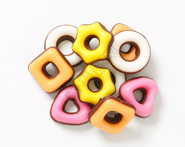 糖果基金会甜点白色黄色食物粉色橙子高架软糖巧克力涂层背景图片