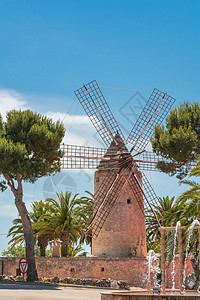西班牙式的旧风车灌溉环保地标面粉文化建筑学载波企业活力旋转背景图片