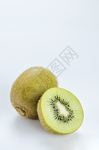 整个水果和一半食物营养白色种子小吃奇异果绿色饮食热带背景图片