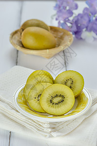 金金菊果热带小吃黄色食物饮食水果盘子白色背景图片