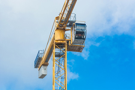 建筑工地的建筑起重机工程建筑学工艺项目设备吊装建造业机械钢缆技术背景图片