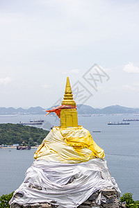 高志昌的岩石塔和全景船舶蓝天岛屿地标码头宝塔背景图片