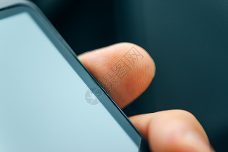 指纹解锁手机使用指纹传感器扫描来解锁智能电话扫描器安全鉴别控制技术生物手指隐私授权识别背景