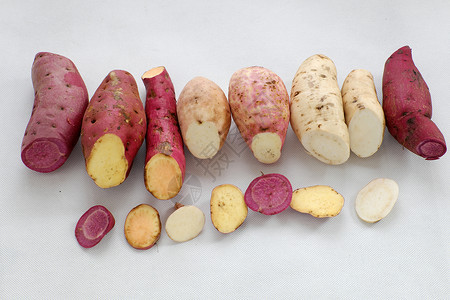 白背景的甜土豆多样性农业食物谷物白色泻药消化道健康饮食团体红色糖果背景图片