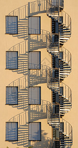 螺旋楼梯建筑学晴天房子阴影背景图片