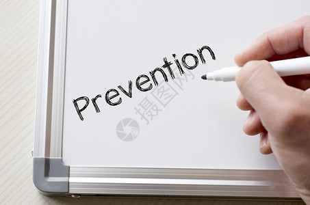 白板上写着预防疾病顾问诊断保健帮助关心警告木板考试测试背景图片