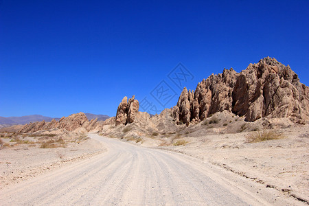 40 号国道 萨尔塔 卡法亚特 阿根廷碎石吸引力干旱旅行岩石地质学荒地游客路线爬坡背景图片