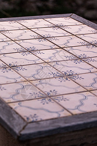 Azulejo表格制品美食桌子文化传统装饰品陶瓷甜点咖啡蓝色背景图片