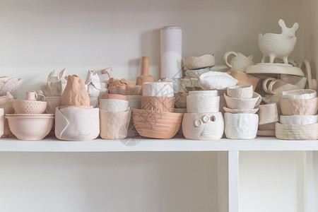 手工制传统瓷原产品花瓶团体制品白色销售陶器店铺工艺杯子产品背景图片