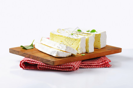 法国Est法国干酪食物白色白皮广场正方形奶制品砧板霉菌背景图片