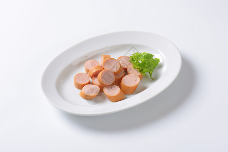维也纳香肠盘子食品猪肉椭圆盘小吃热狗鸡肉食物高清图片