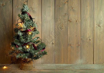 圣诞树背景问候广告丝带丝绸乡村木头背景图片