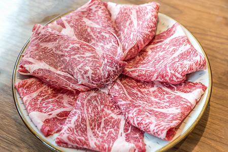 酱梅肉牛肉纹理用餐洋葱宏观美食盘子食物烹饪背景