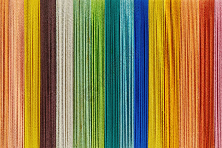 七彩纱背景纬纱彩虹风格纤维生产羊毛装饰杂色细绳纺织品背景图片