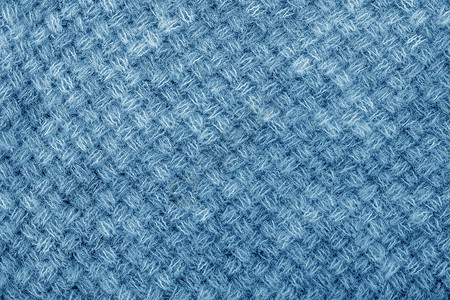 蓝色球衣机器编织花样中的辫子材料羊绒针织品技术柔软度蓝色针线活装饰羊毛风格背景