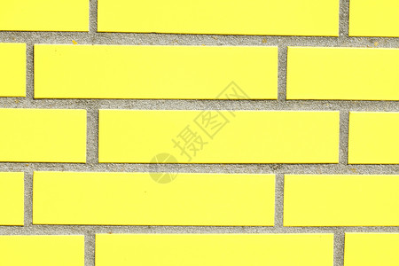黄墙砖墙混合物关节石墙房子黄色砖块建筑石头积木背景图片