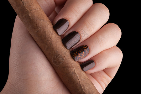 棕色钉子女孩创造力凝胶指甲广告手指艺术化妆品卫生烟草背景图片