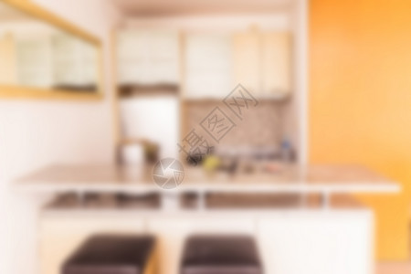 VI素材小型厨房的抽象模糊与柜台 现代风格vi家具桌子用餐展示食物架子房子房间窗户背景背景
