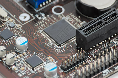 电子板闭合的碎片安装微电路印刷组装电脑电子电阻器芯片元器件电子产品背景图片