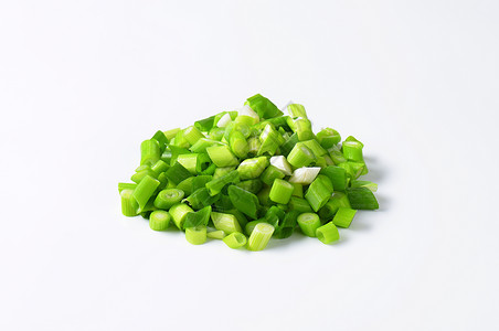 被压住的绿洋葱大葱蔬菜洋葱食物背景图片