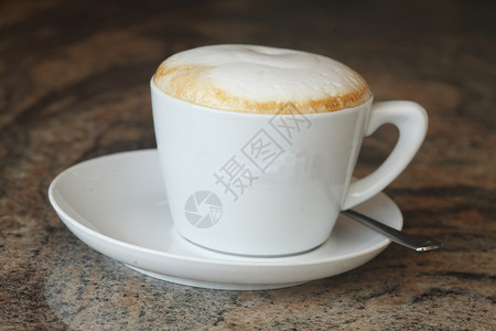 卡布奇诺杯白色杯子咖啡背景图片