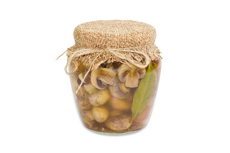 玻璃罐中提取的按扣蘑菇香料装罐草药盐水食品玻璃烹饪食物厨房罐子背景图片