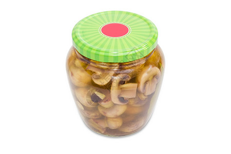 玻璃罐中提取的按扣蘑菇螺丝帽家庭草药盐水烹饪食物装罐厨房玻璃瓶食品背景图片