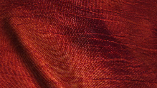 红色丝织品在风中飘扬纺织品帧数丝绸漂移波纹图案天鹅绒衣服海浪镜头背景图片