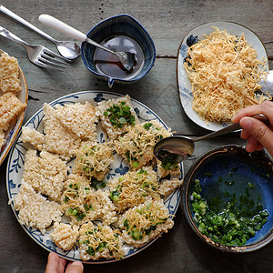 越南街头食物 可香茶青烟盘子背景干饭油炸休闲食品香肠女人美食安全背景图片