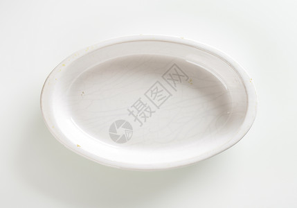 深奥伏瓷瓷盘椭圆形制品陶瓷炊具盘子陶器白色餐具高架菜盘背景图片