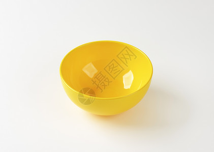 黄黄碗餐具盘子圆形点心陶器制品陶瓷背景图片