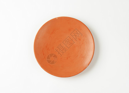Terracotta 餐盘圆形高架陶器餐具制品乡村陶瓷盘子背景图片