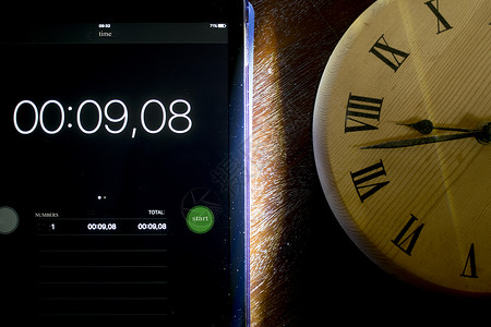 现代和古代时钟时间计时器数字跑表技术背景图片
