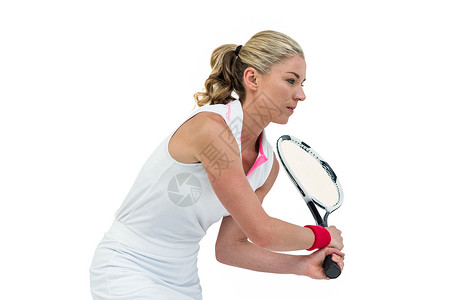 运动员与球拍打网球姿势运动服女性播放器运动女士专注竞技头发活动背景图片