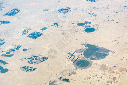 沙漠圆形田的空中观测图生态农场耕地农村农田枢轴环境土地栽培鸟瞰图背景